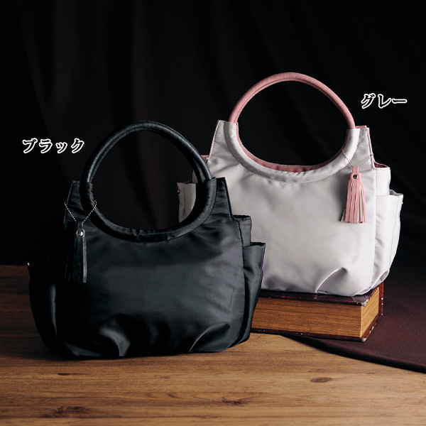 タッセル付き丸手 手提げバッグ