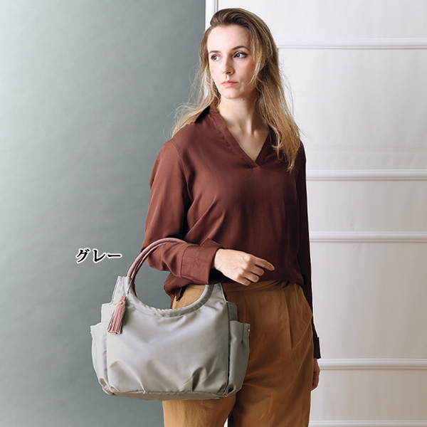 タッセル付き丸手 手提げバッグ