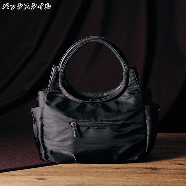 タッセル付き丸手 手提げバッグ