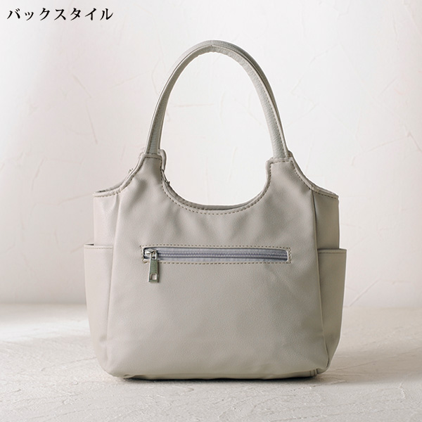 タッセル付コンビ手提げバッグ